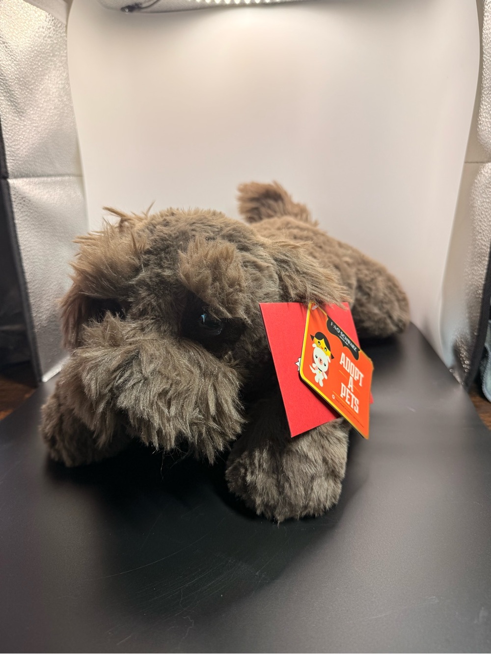 FAO Schwarz Brown Plush Dog Toy with Adopt-a-Pet Tag